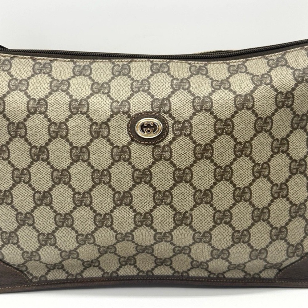 #34. Vintage Gucci Supreme Clutch GG Canvas Bag Authentic